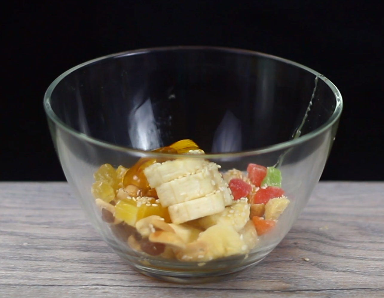 Canapé from cracker and Fruit salad with candied fruit